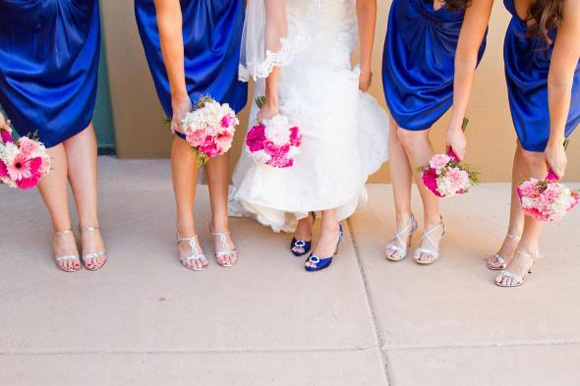 Mismatched Shoes Done Right: strappy gold sandals that are different, but still tie in with each other due to low profile details, thin straps, and similar heel heights.
