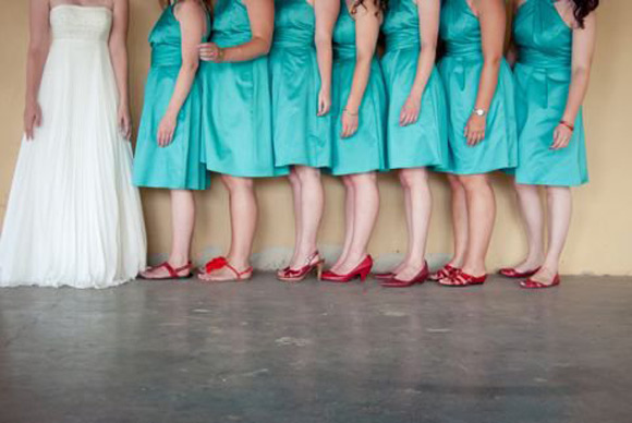 Well... The idea for all red shoes was a good one. But we have some heels, some flats, some thong style with heavy detail... Mismatched shoes and a mismatched look is what's happening here. They're all just TOO different.